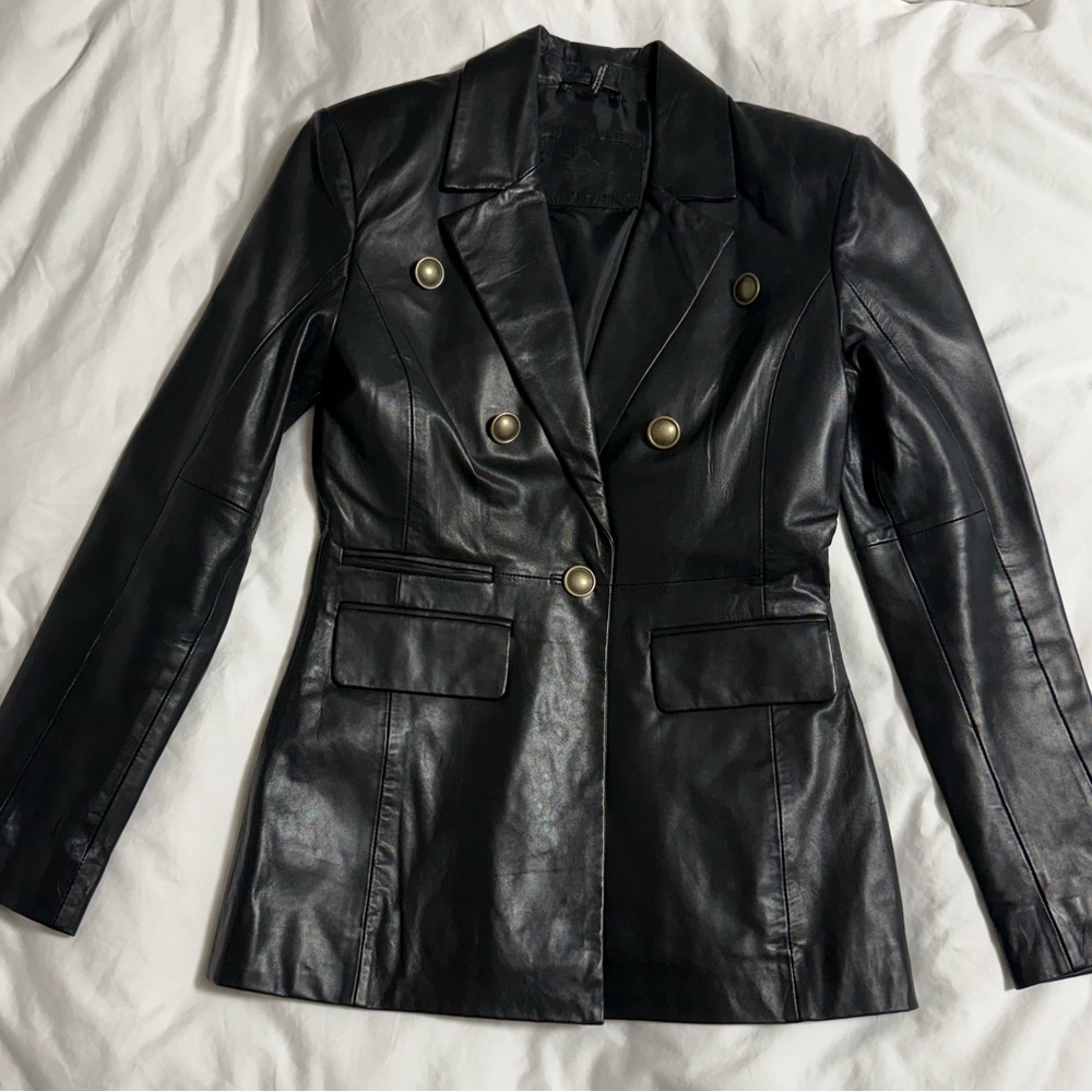 Elegant Black Leather Jacket with Gold Accents